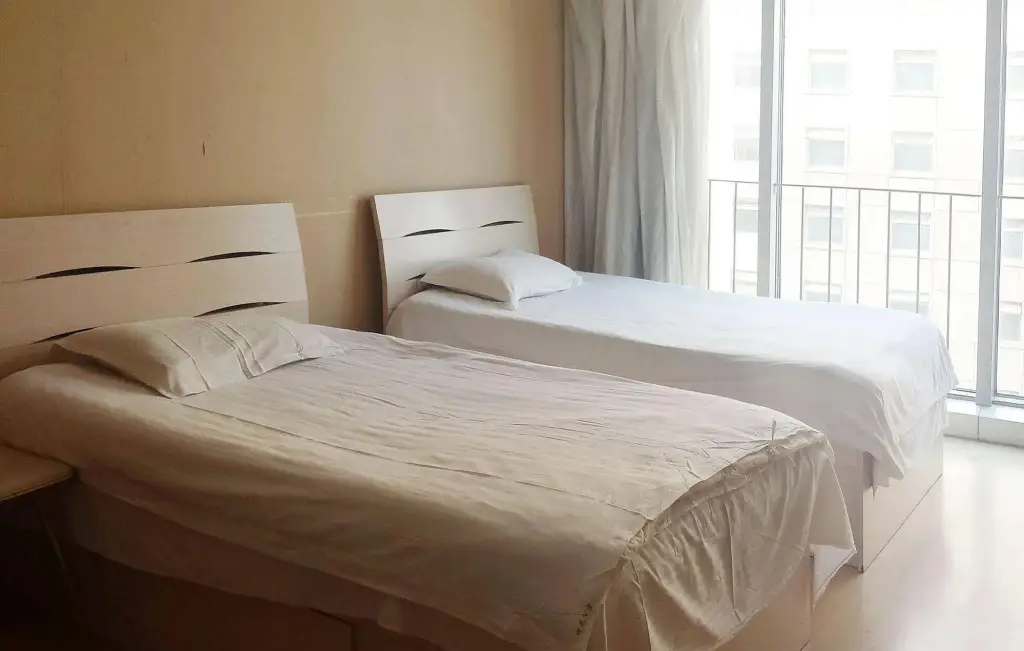 Далянь: Dalian Jinchen International Hotel Apartments