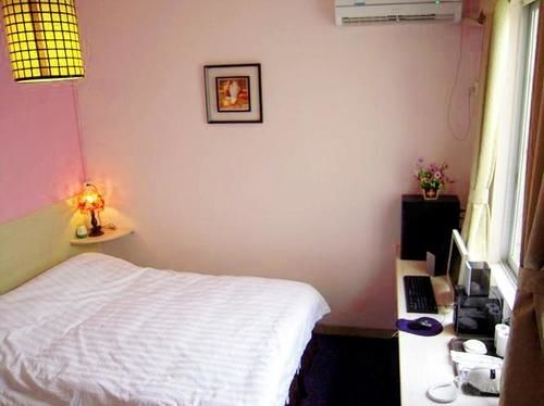 Гуанчжоу: Guangzhou Lingnan Home Chain Apartment University Town
