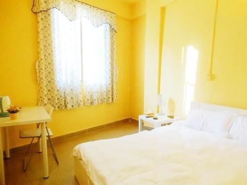 Гуанчжоу: Guangzhou Lingnan Home Chain Apartment University Town