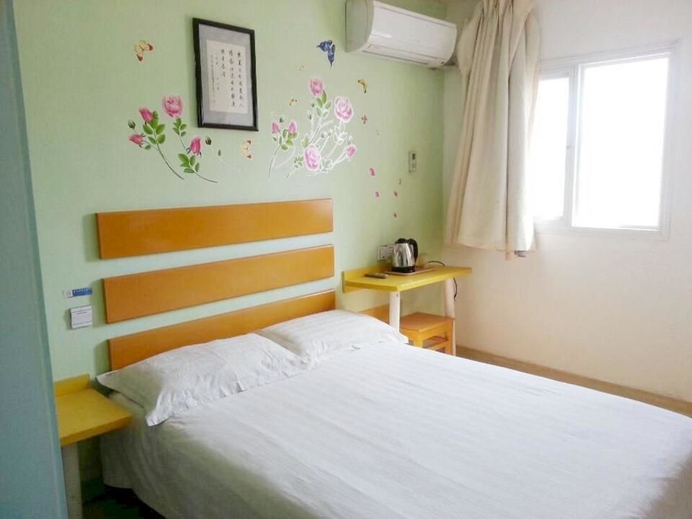 Циндао: Xindingxiang Business Hotel Qingdao Long Distance Bus Station