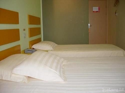 Циндао: Xindingxiang Business Hotel Qingdao Long Distance Bus Station