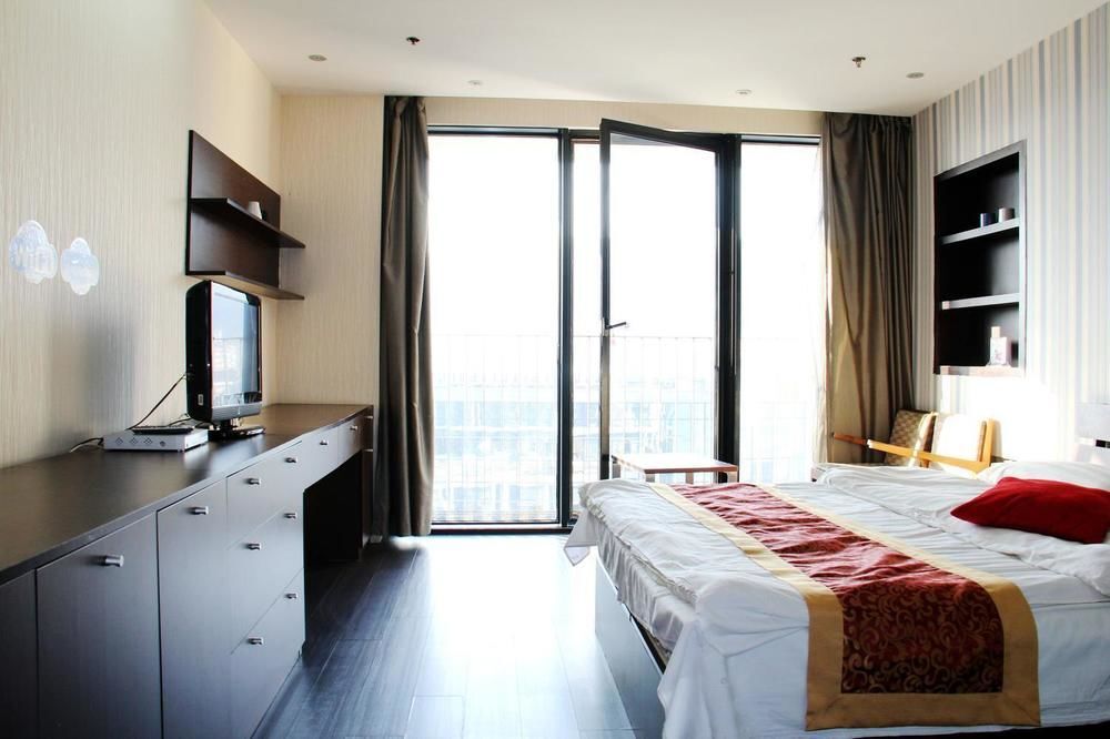 Далянь: Enji Apartment Hotel Bainianhui - Dalian