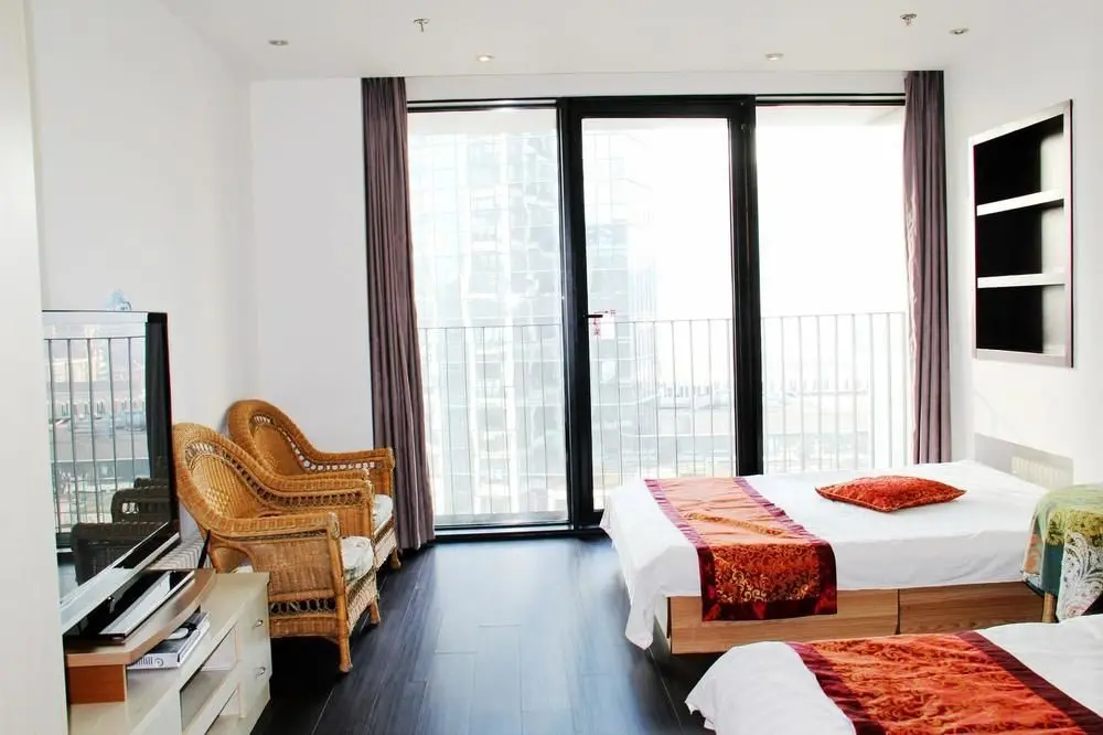 Далянь: Enji Apartment Hotel Bainianhui - Dalian