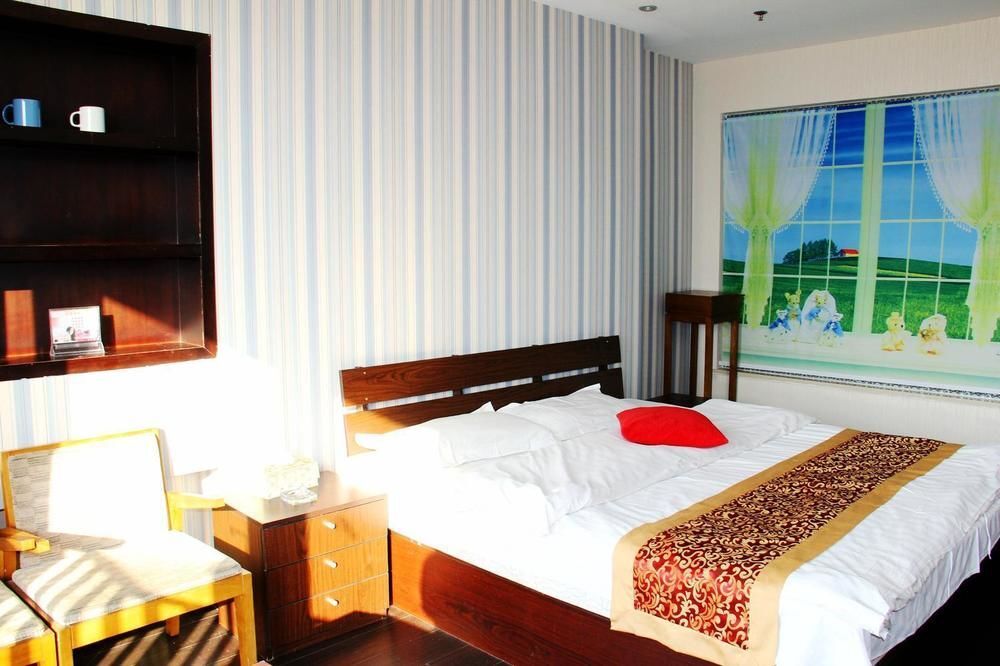 Далянь: Enji Apartment Hotel Bainianhui - Dalian