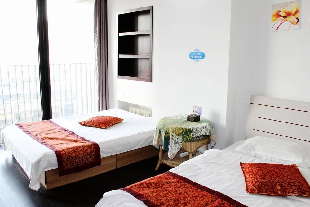 Далянь: Enji Apartment Hotel Bainianhui - Dalian