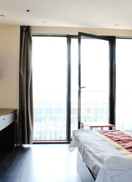 Далянь: Enji Apartment Hotel Bainianhui - Dalian
