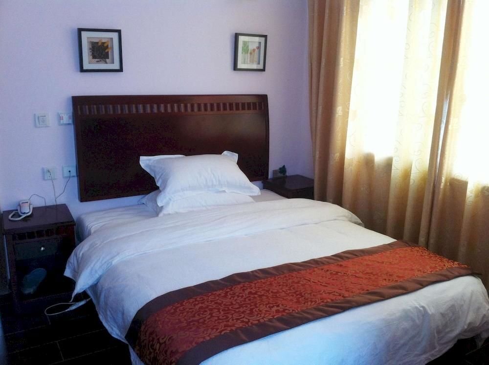 Фэньи: Qianglong Business Hotel - Maoxian