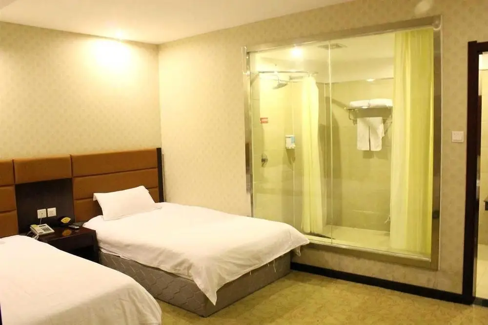 Кайфын: Zhaoxing Business Hotel