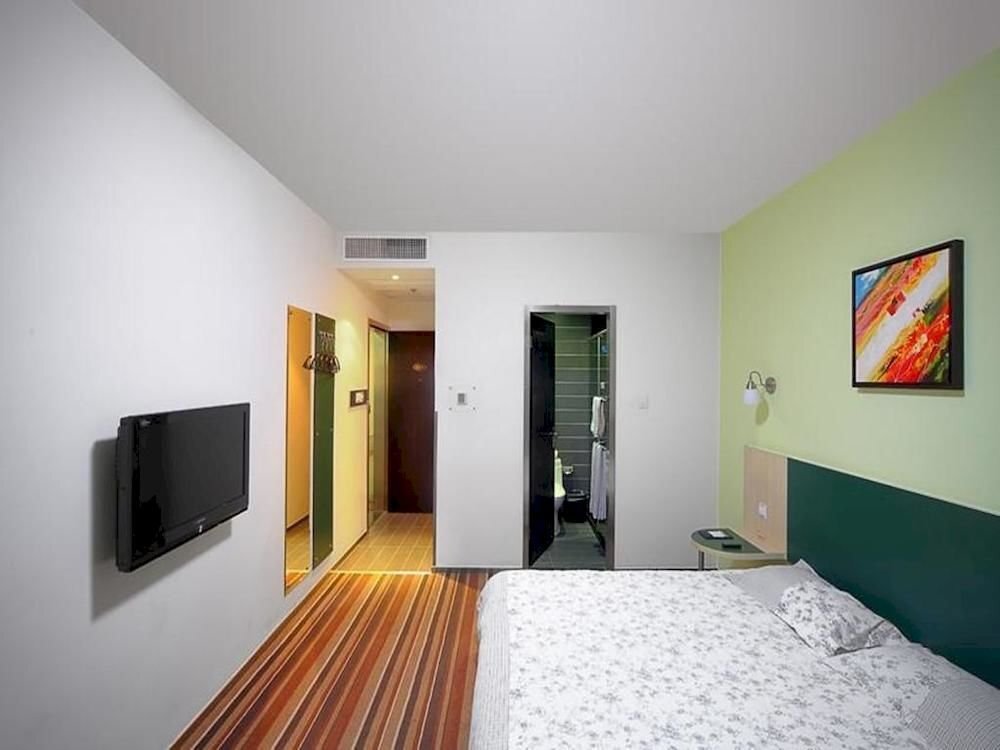 Уси: Motel 168