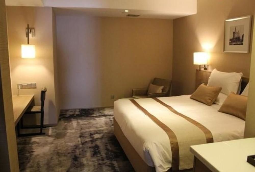 Шанхай: Shanghai Xujiahui 80,000 Stadium Quli Hotel