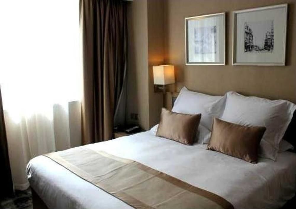 Шанхай: Shanghai Xujiahui 80,000 Stadium Quli Hotel