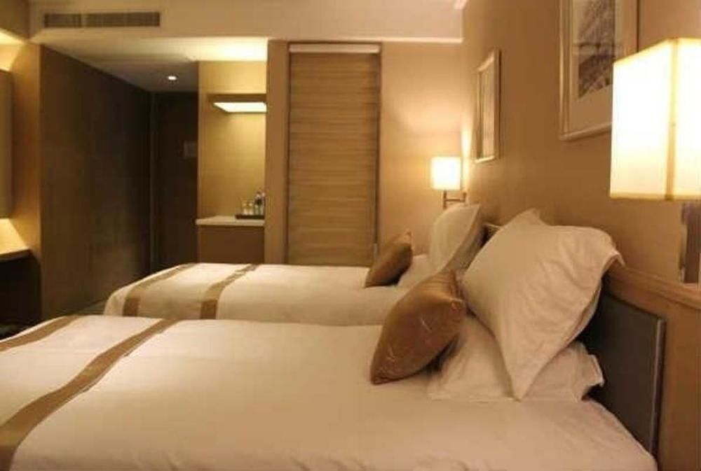 Шанхай: Shanghai Xujiahui 80,000 Stadium Quli Hotel