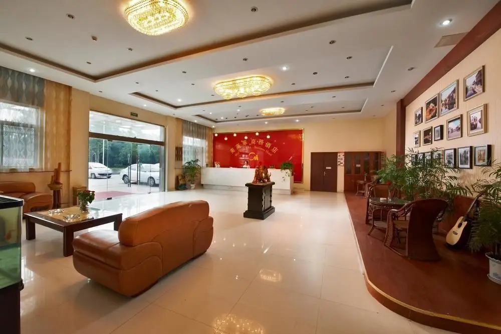 Уси: Meigaohua Business Hotel