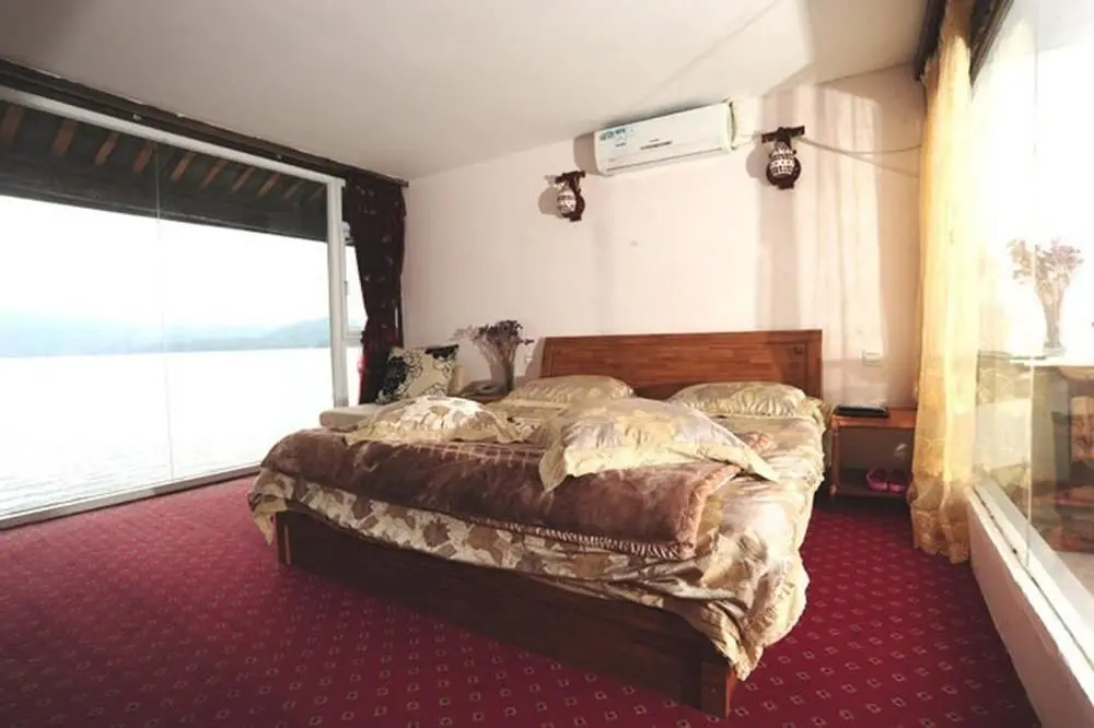 Лицзян: Lijiang Lugu Lake Nv'er Garden Hotel