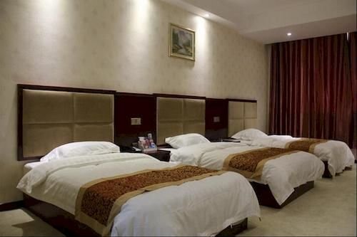 Лиаоченг: Oushang Business Hotel