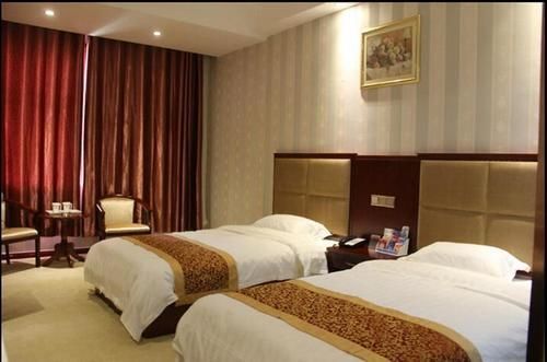 Лиаоченг: Oushang Business Hotel