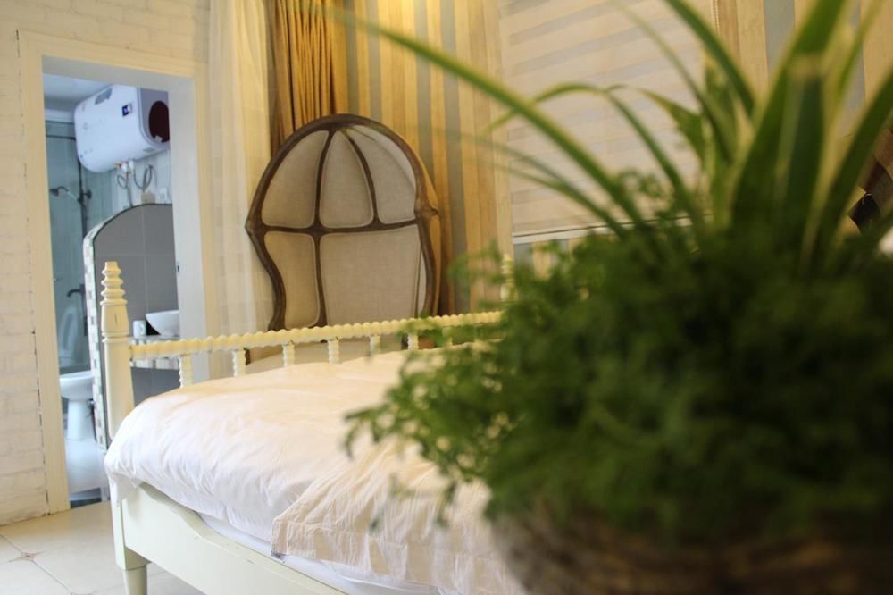Цзясинь: Xitang Ruozhiyoulan Putike Inn