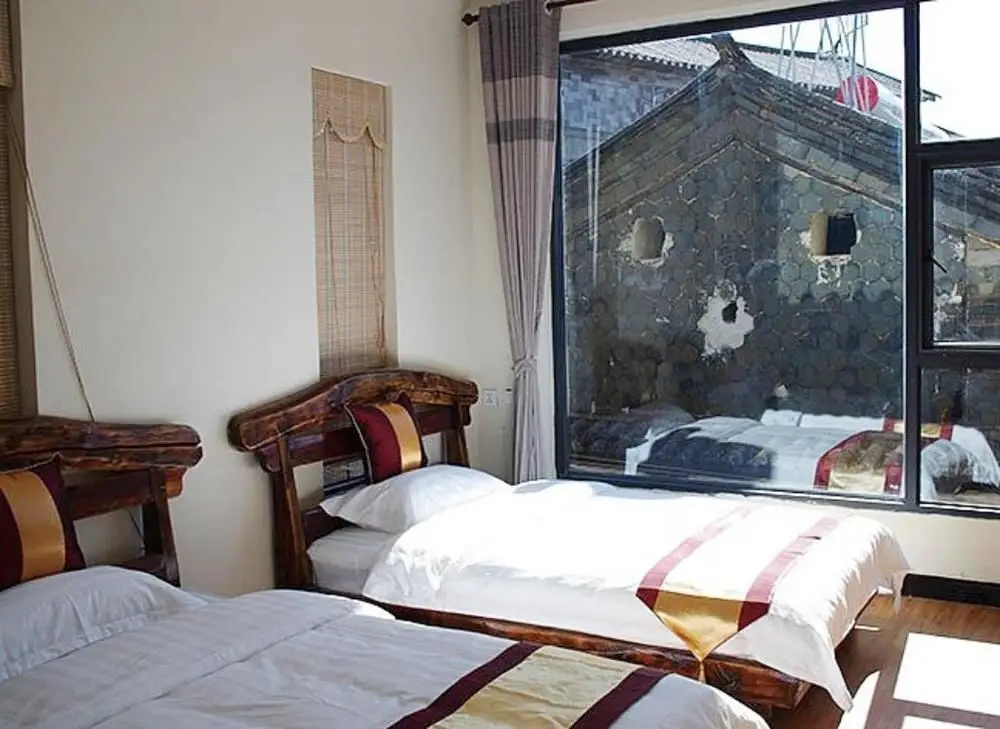 Дали: Dali Shuanglang Mafengwo Inn