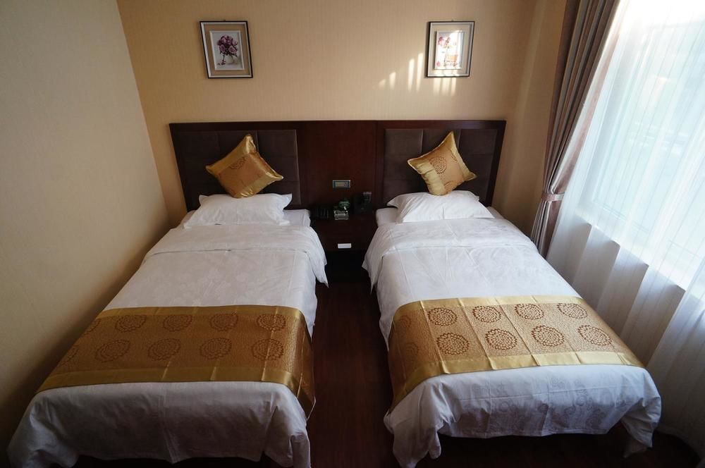 Лиаоченг: Sunshine Holiday Hotel