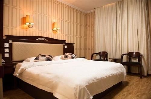 Циндао: Qingdao Shengyu Business Hotel