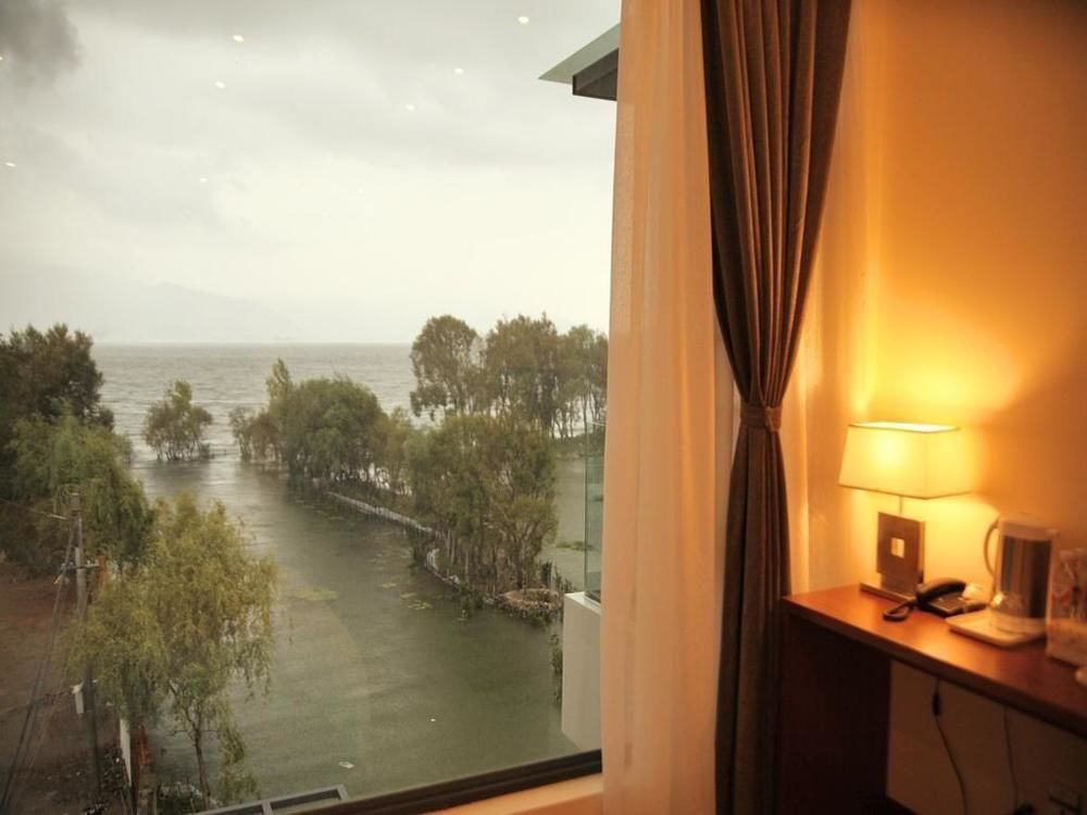 Xizhou Taoyuan No.1 Sea View Holiday Hotel — фото 1