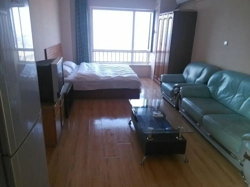 Далянь: Xinduhui Hotel Apartment