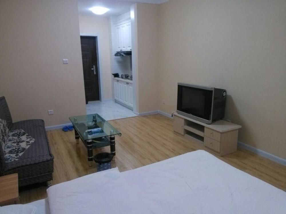 Далянь: Xinduhui Hotel Apartment