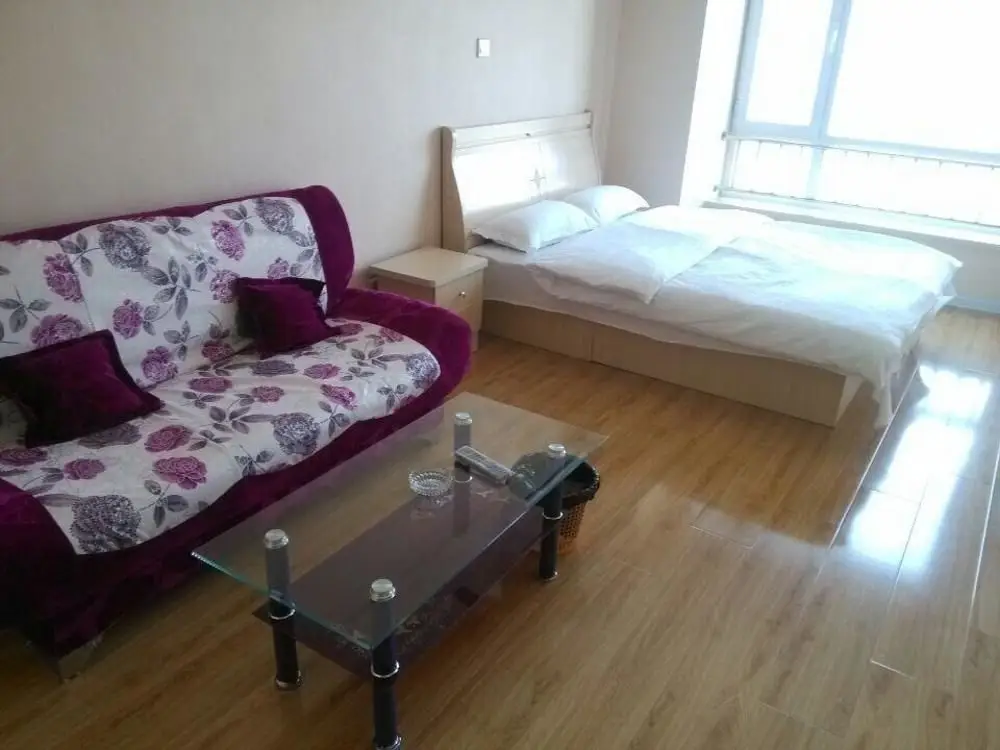 Далянь: Xinduhui Hotel Apartment