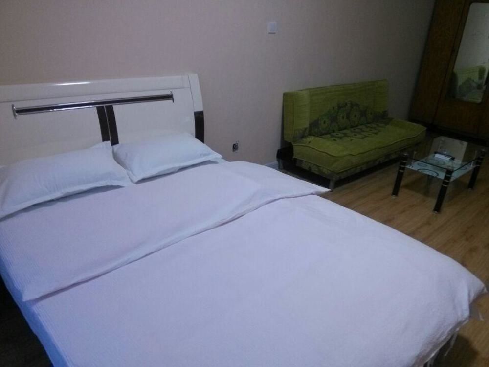 Далянь: Xinduhui Hotel Apartment