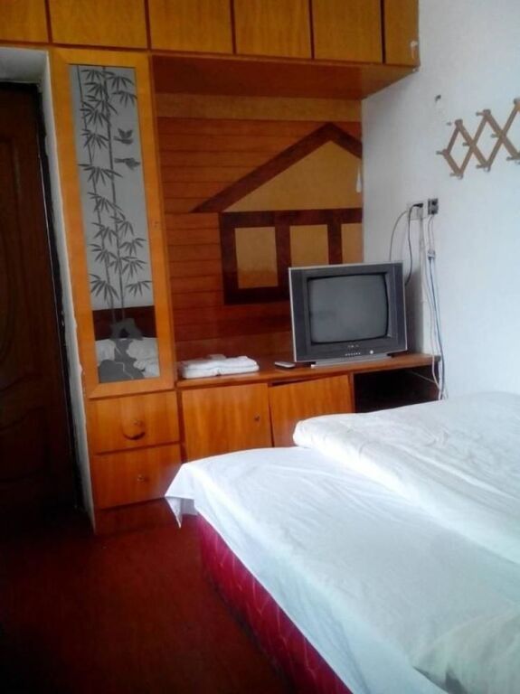 Уси: Wuxi Cozy Inn