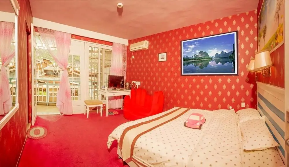 Яншо: Yangshuo Xijie Tianranju Hotel