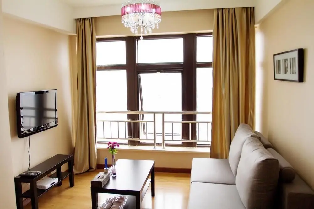 Dalian Jinfeng Tower Yijia Hotel Apartment — фото 1