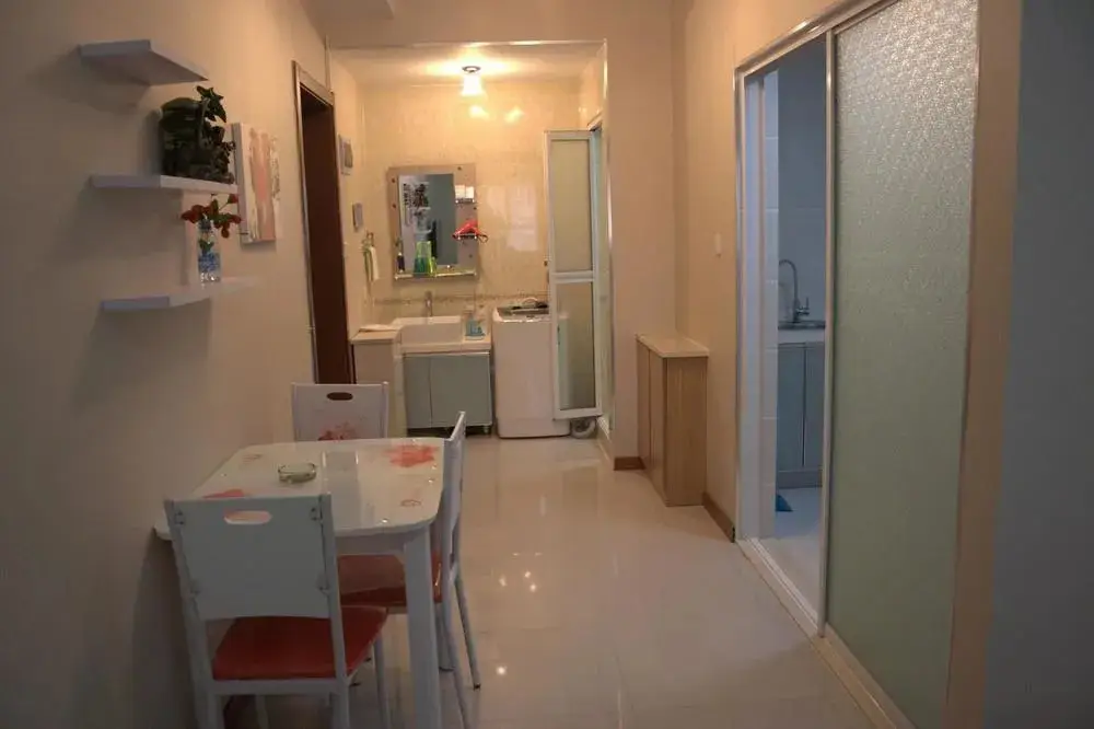 Далянь: Dalian Jinfeng Tower Yijia Hotel Apartment