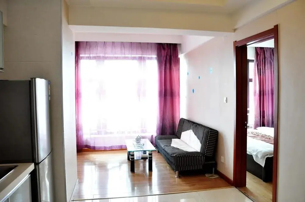 Далянь: Dalian Jinfeng Tower Yijia Hotel Apartment