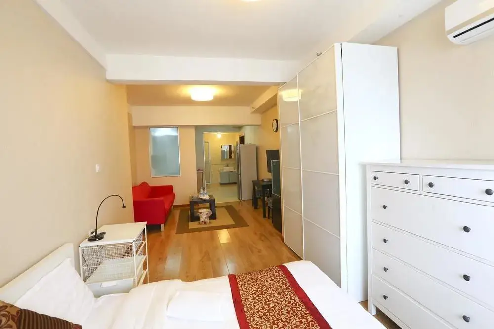 Далянь: Dalian Jinfeng Tower Yijia Hotel Apartment