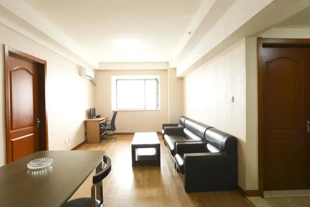 Далянь: Dalian Jinfeng Tower Yijia Hotel Apartment