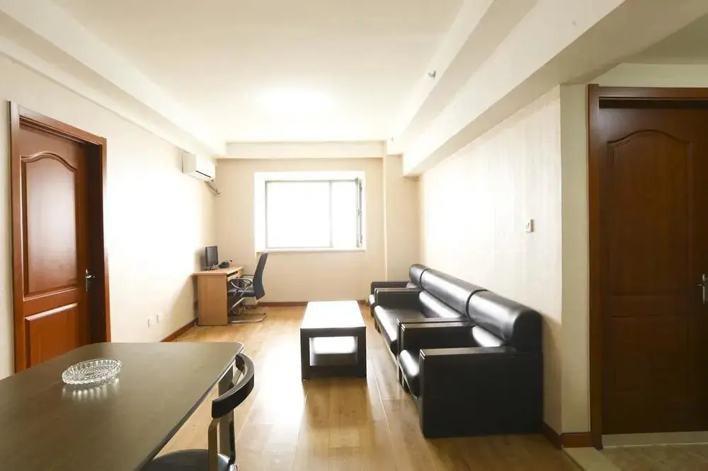 Далянь: Dalian Jinfeng Tower Yijia Hotel Apartment
