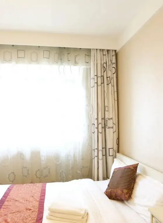Далянь: Dalian Jinfeng Tower Yijia Hotel Apartment