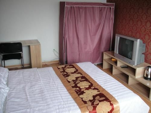Циндао: Qingdao Fuzhi Xiangming Family Apartment