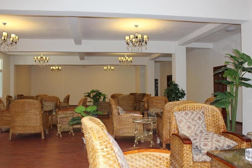 Мокси: Hailuogou Yijiawenquan Hotel