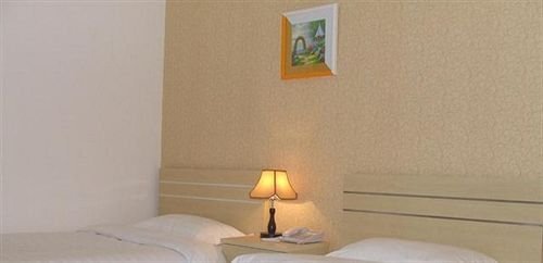 Циндао: Huameida Business Hotel - Qingdao