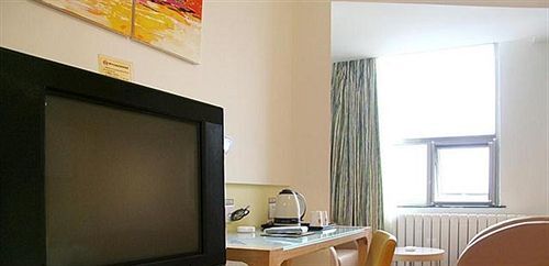 Циндао: Yinzuo Jiayi Hotel - Qingdao