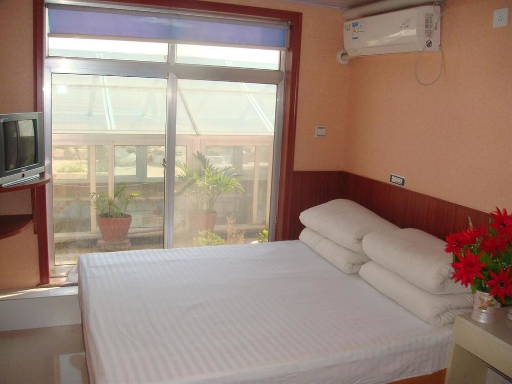 Пэнлай: Penglai Maosheng Fisher Apartment Hotel