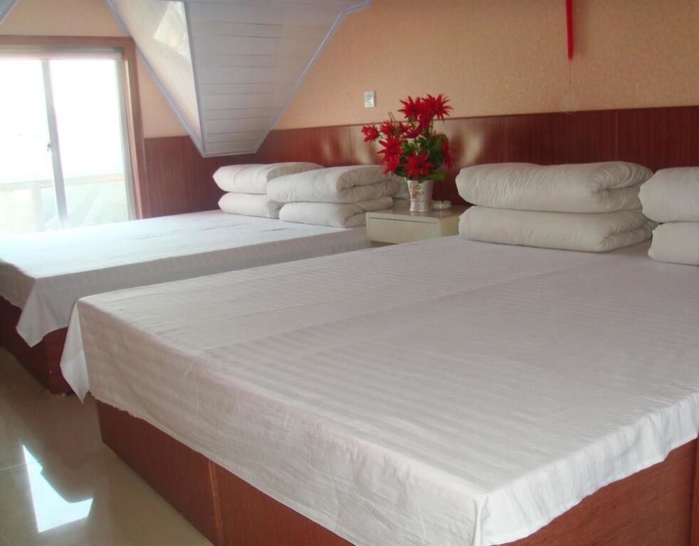 Пэнлай: Penglai Maosheng Fisher Apartment Hotel