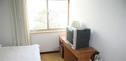 Циндао: Badaguan Yushuiqing Business Hotel - Qingdao