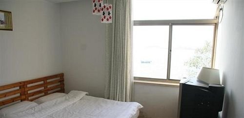 Циндао: Badaguan Yushuiqing Business Hotel - Qingdao