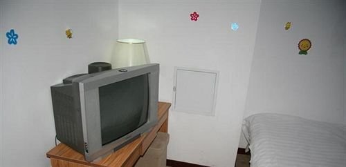 Циндао: Badaguan Yushuiqing Business Hotel - Qingdao