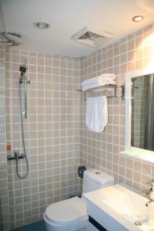 Чжэнчжоу: Zhengzhou Gaocheng Business Hotel