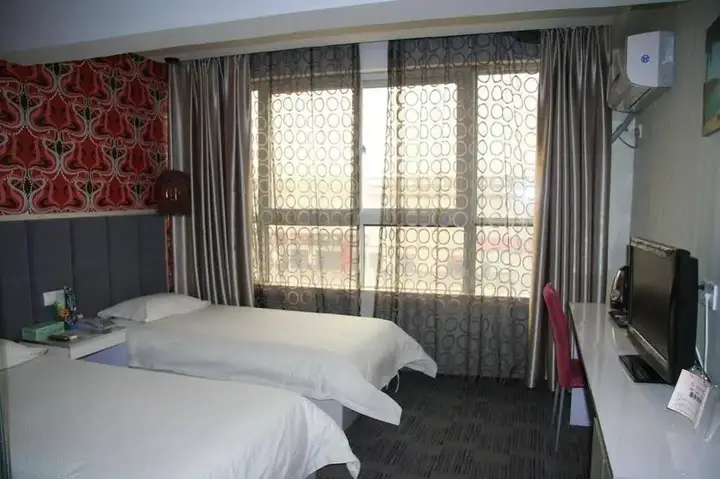 Чжэнчжоу: Zhengzhou Gaocheng Business Hotel