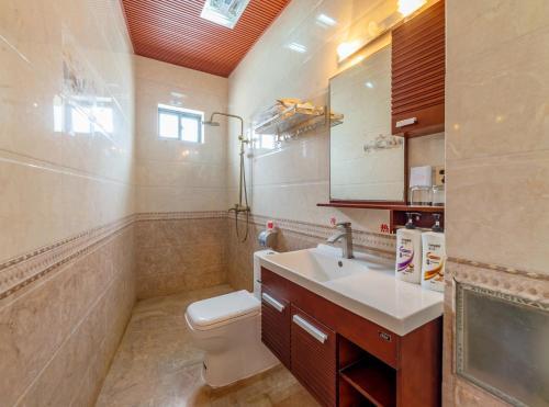 Дали: Dali Shuanglang Haiyue Xinju Guesthouse